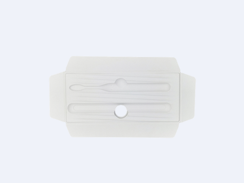 Electronic pen packaged in white wet press paper with inner tray